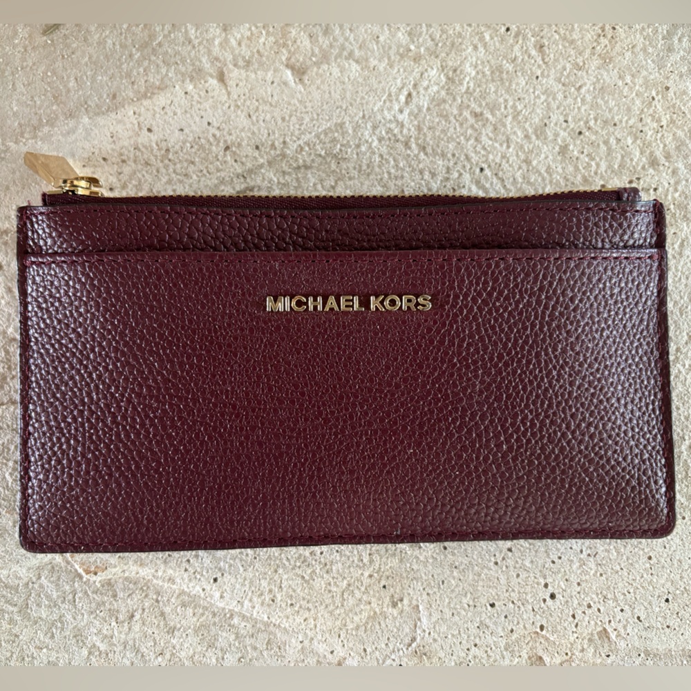 Burgundy Michael Kors slim wallet